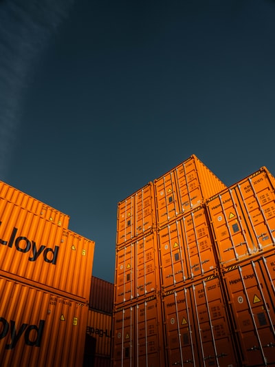 Brown cardboard boxes under the blue sky during the day
